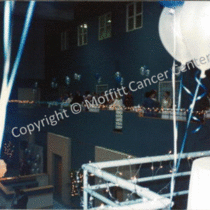 [Center decorated with blue and white balloons for BMT celebration]